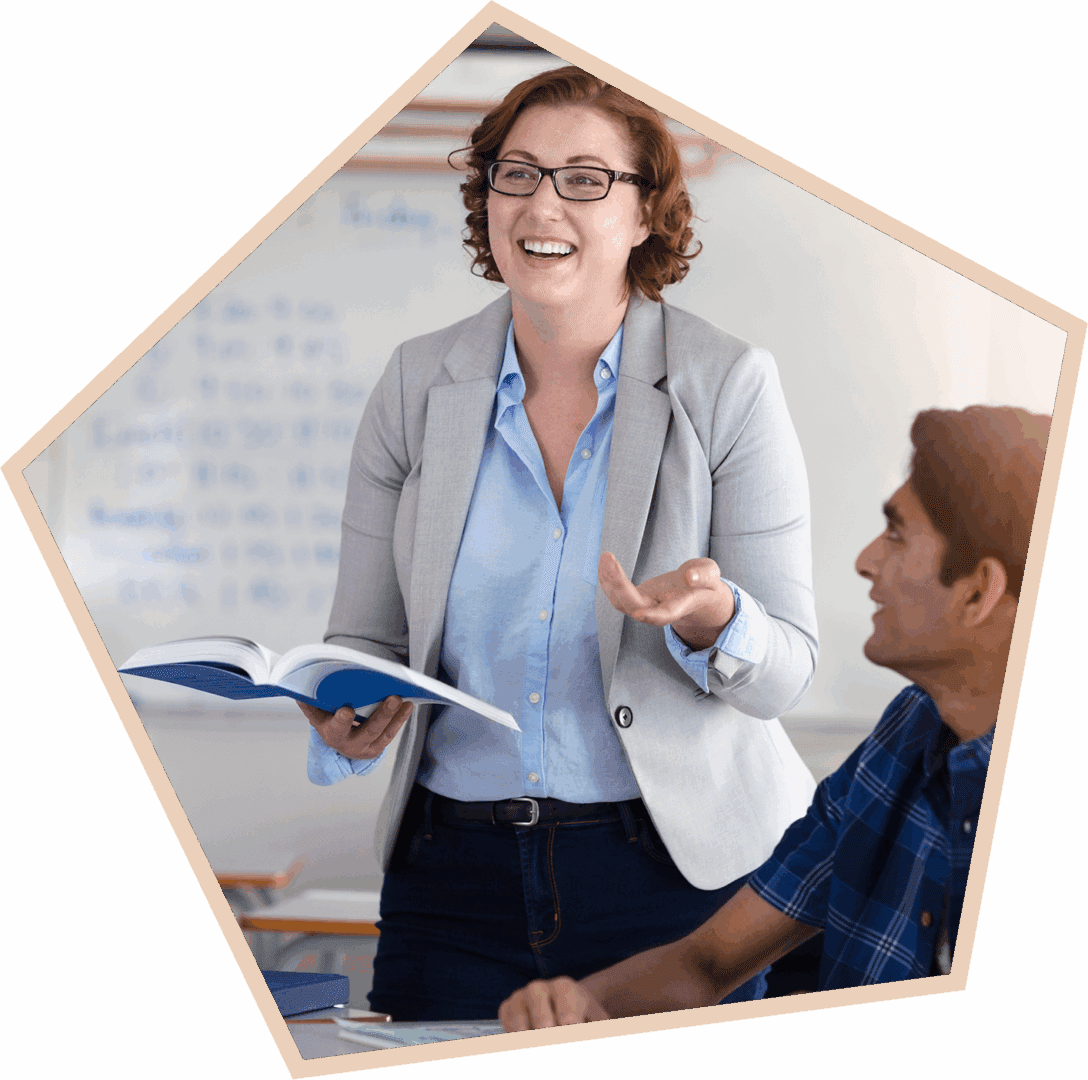 Teacher engaging students in classroom discussion.